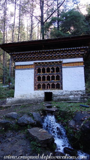 Water-driven prayer wheel