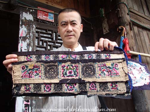 The piece of embroidery that the woman will enter in the annual provincial craftmanship competition (back)