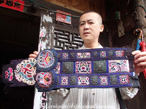 The piece of embroidery that the woman will enter in the annual provincial craftmanship competition
