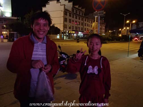 Girl and her dad in the square