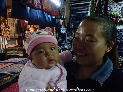 Shopkeeper and her baby Shopkeeper and her baby