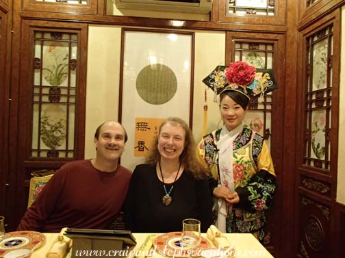 Posing with our server at the Bai Family Restaurant