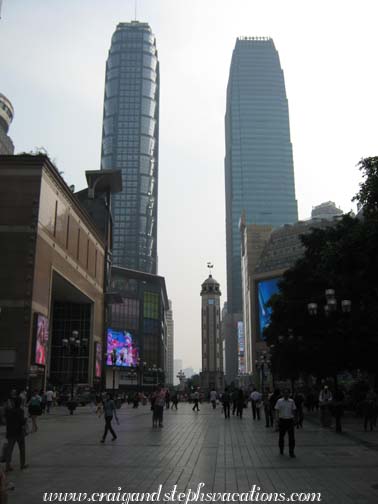People's Liberation Monument is dwarfed by skyscrapers, Jeifangbei Square, Chongqing People's Liberation Monument is dwarfed by skyscrapers, Jeifangbei Square, Chongqing