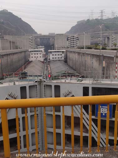 Two ships pass through the lock simultaneously with little room to spare