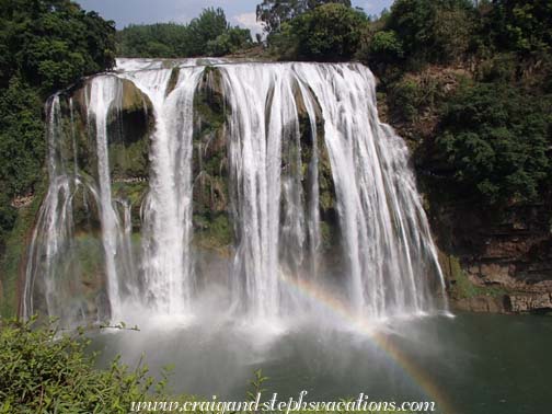 Huangguoshu Falls with a rainbow in its mist