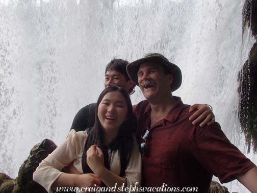 Craig and his new friends behind Huangguoshu Falls