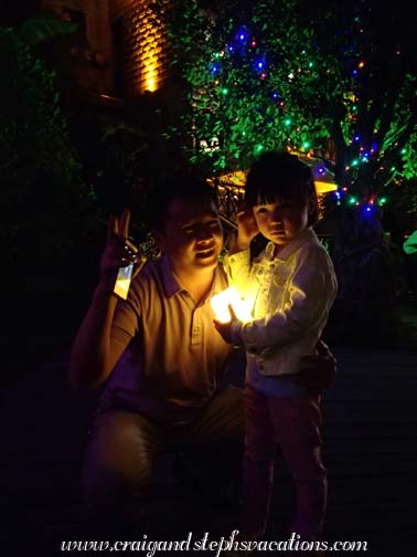 Friendly tourist and his young daughter at the resort