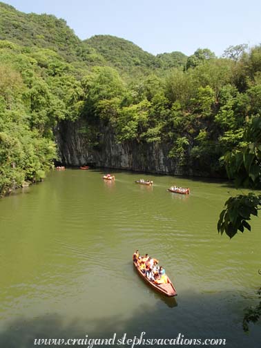 Boats about to enter the Dragon Palace water caves