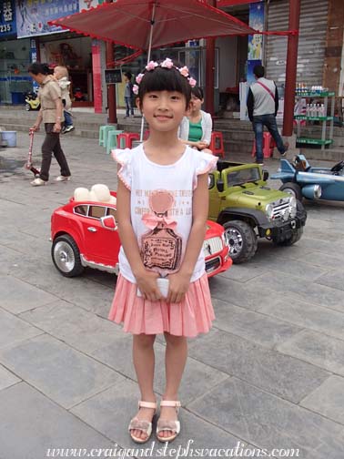 Our new friend who wanted a photo with us in Kaili Square