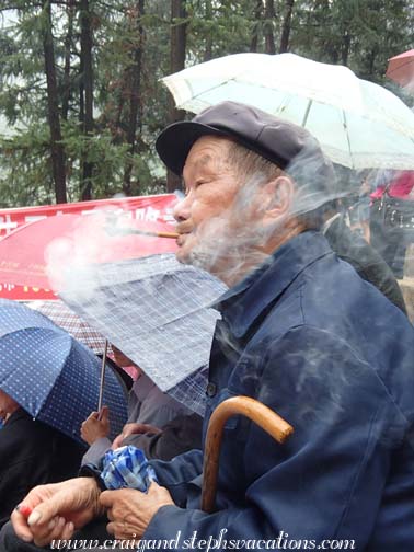Bullfight spectator smoking his pipe Bullfight spectator smoking his pipe