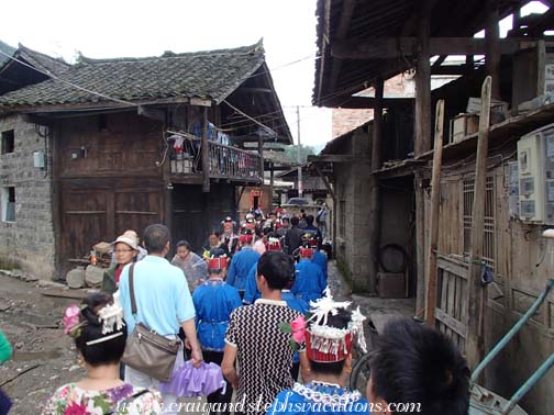 Walking through Shidong Village to the festival grounds Walking through Shidong Village to the festival grounds