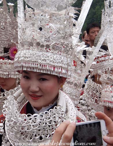 Traditional meets modern as festival-goers share pictures in real time using We Chat Traditional meets modern as festival-goers share pictures in real time using We Chat