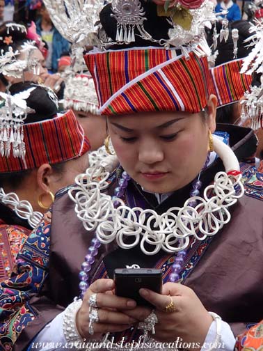 Traditional meets modern as festival-goers share pictures in real time using We Chat Traditional meets modern as festival-goers share pictures in real time using We Chat