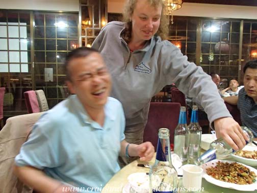 Pouring the last of the beer for Wang Jun before he can force it on Craig Pouring the last of the beer for Wang Jun before he can force it on Craig
