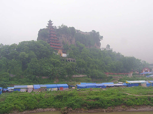 Shi Bao Zhai before the Three Gorges Project flooding (Photo courtesy of Richardelainechambers at the English language Wikipedia, via Wikimedia Commons)