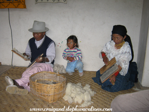 Jose Carlos de la Torre and his wife demonstrate hand carding wool Jose Carlos de la Torre and his wife demonstrate hand carding wool