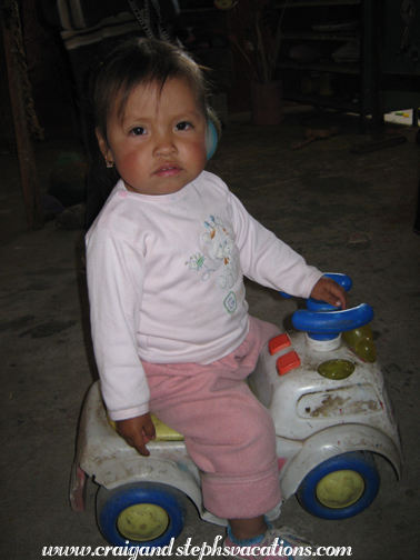 Sisa rides a car at the day care center Sisa rides a car at the day care center