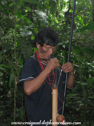 Carlos prepares a dart Carlos prepares a dart