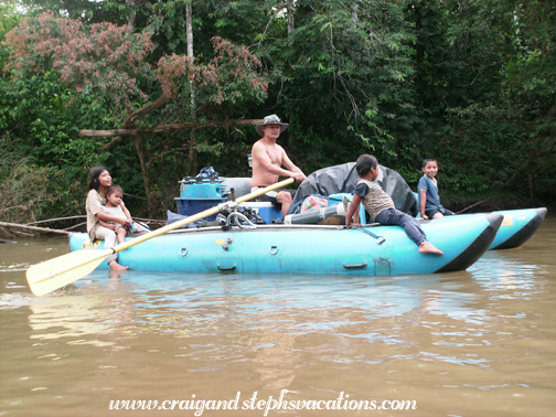 Huaorani kids hitch a ride on Arturo's supply boat