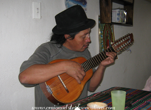 Antonio plays his mandolin