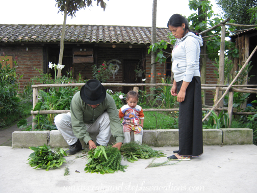 Antonio gathers plants to be blessed at the Palm Sunday Mass
