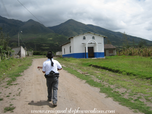 Antonio serenades us while we walk to Rosa's land