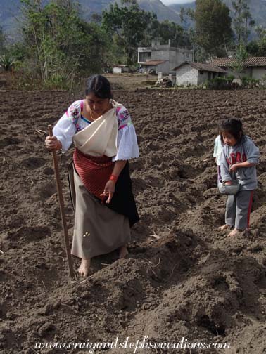 Rosa drops 3 corn kernels into a hole while Yupanqui follows with beans Rosa drops 3 corn kernels into a hole while Yupanqui follows with beans