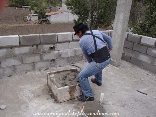 Antonio mixes concrete on the 3rd floor Antonio mixes concrete on the 3rd floor