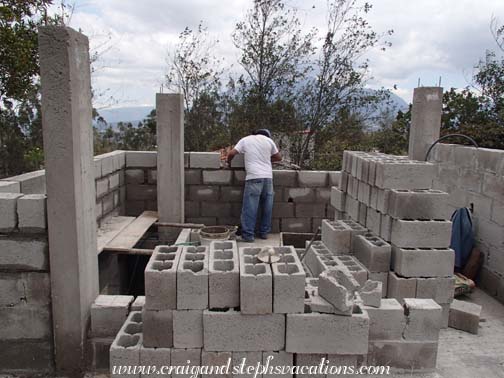 Marcelo lays concrete blocks for the 3rd floor walls