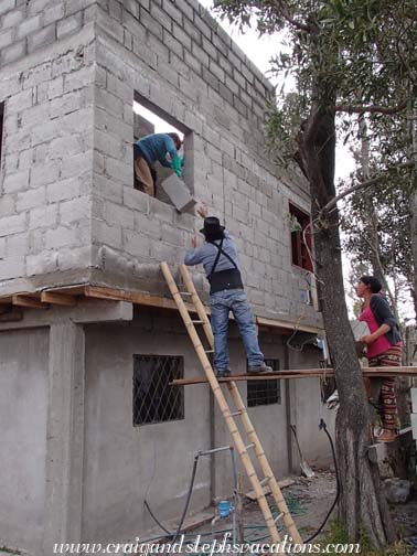 Assembly line to get more cement blocks up to the worksite