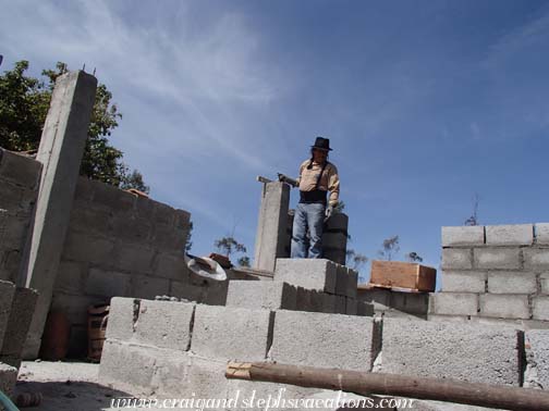 Antonio works on 3rd floor construction Antonio works on 3rd floor construction