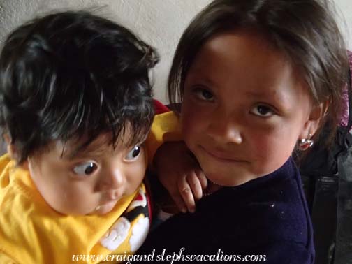 Sisa holds her cousin Ariel