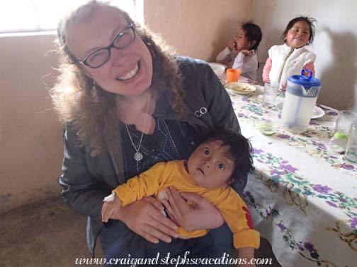 Steph holds baby Ariel