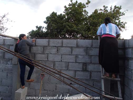 Aida and Sandra work with the rebar