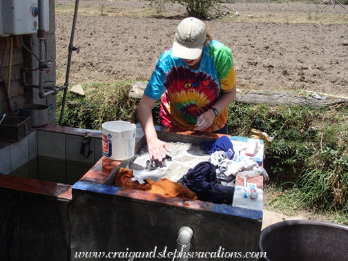 Steph cleans the laundry by hand