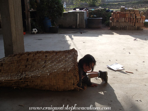 Yupanqui and Tayanta play in their tortora reed tunnel Yupanqui and Tayanta play in their tortora reed tunnel