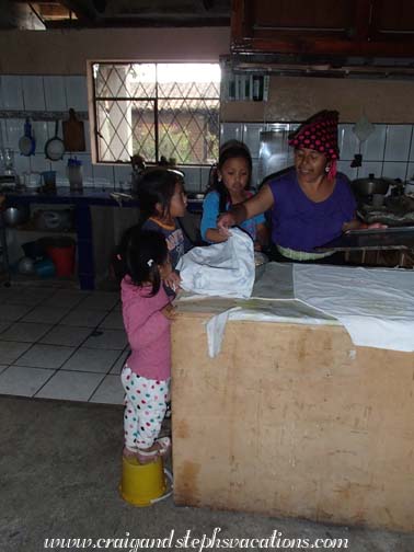 Rosa and the kids prepare to make bread for Dia de los Muertos Rosa and the kids prepare to make bread for Dia de los Muertos