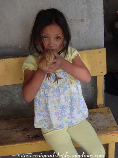 Sisa with a baby chick Sisa with a baby chick