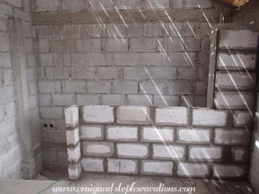 New half wall above the staircase