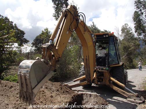 The backhoe digging the sewer line The backhoe digging the sewer line