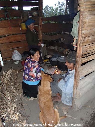 Rosa, Abuelita, Juan Pedro, Max the dog, and Chipi the cat enjoying the warmth of the fire Rosa, Abuelita, Juan Pedro, Max the dog, and Chipi the cat enjoying the warmth of the fire