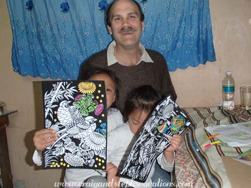 Sisa and Yupanqui show off their coloring skills Sisa and Yupanqui show off their coloring skills