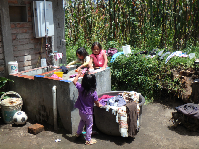 Kids doing laundry