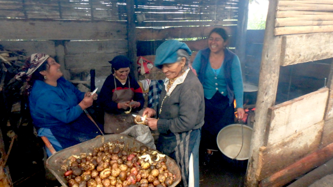 The women preparing food for tomorrow's baptism
