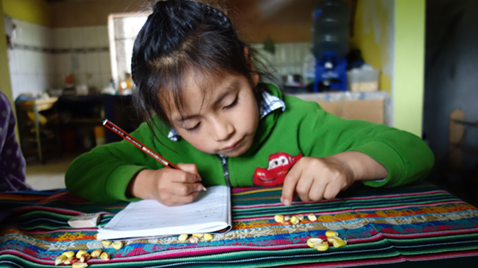 Yupanqui doing his multiplication homework using corn kernels as counting aids