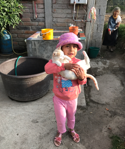Shina and El Senor Chipikins with Abuelita photobomb