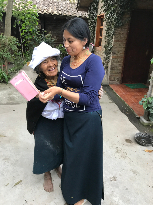 Aida shows Abuelita video of Yupanqui's soccer practice