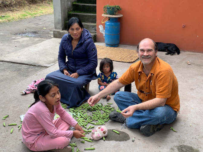 Shina, Aida, Adeliz Dashel, and Achi Taita shucking beans