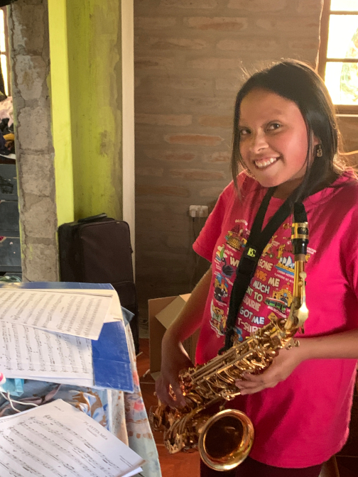 Sisa practicing her sax