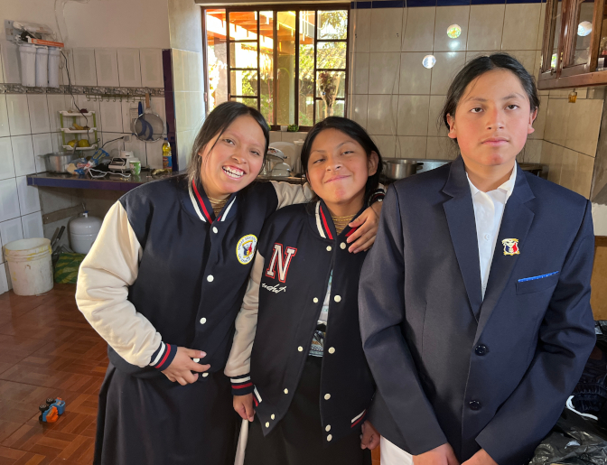 Sisa, Shina, and Yupanki in their school uniforms